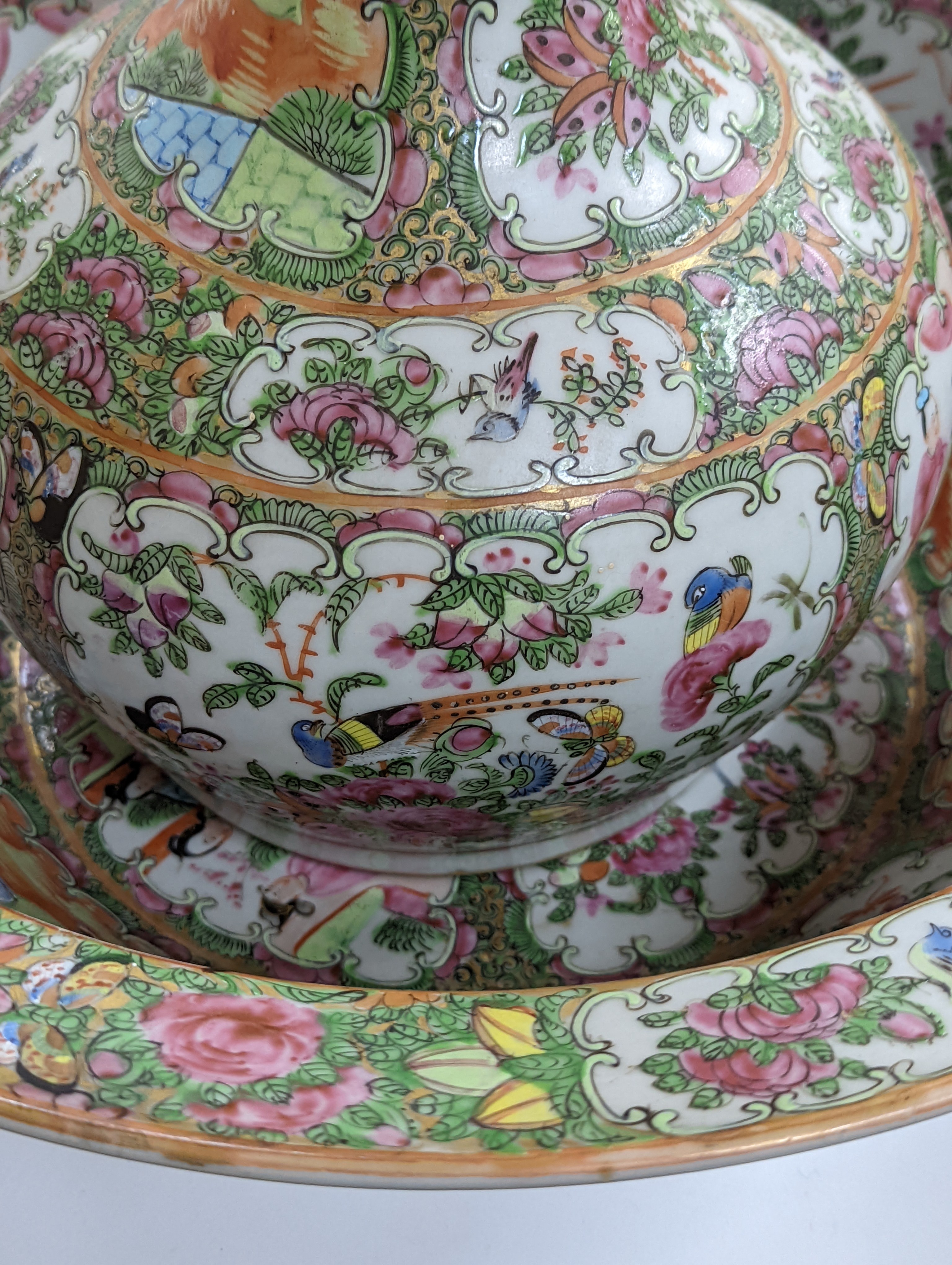 A 19th century Chinese famille rose water bottle with cover and basin, water bottle and cover 39 cms high.